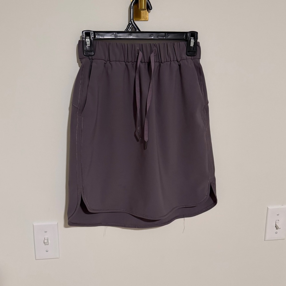 Lululemon Womens Athletic Skirt Size 4 Purple‎ Drawstring Pocket Tulip Hem Skort